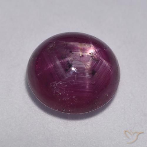 rubí estrella Púrpura oscuro medio natural de 5.43 ct, Ovalada, Translúcido