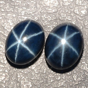 Gemas de zafiro estrella azul natural de  ct, corte óvalo, translúcido