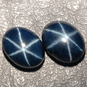 Gemas de zafiro estrella azul natural de  ct, corte óvalo, translúcido