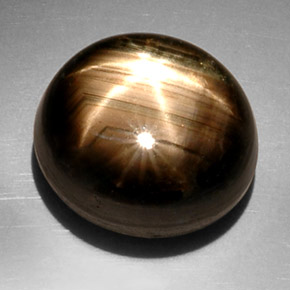 Zafiro estrella negro natural de 22,55 ct, corte óvalo, opaco