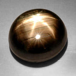 Zafiro estrella negro natural de 22,55 ct, corte óvalo, opaco