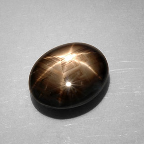 Zafiro estrella negro natural de 7,59 ct, corte óvalo, opaco