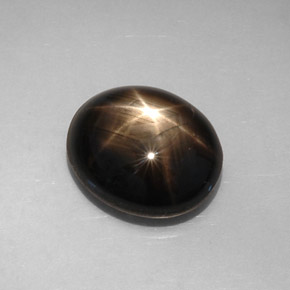 Zafiro estrella negro natural de 8,19 ct, corte óvalo, opaco