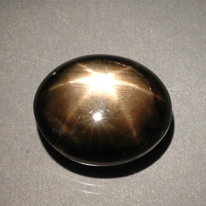 Zafiro estrella negro natural de 8,56 ct, corte óvalo, opaco