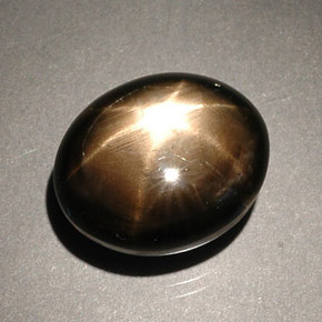 Zafiro estrella negro natural de 8,56 ct, corte óvalo, opaco