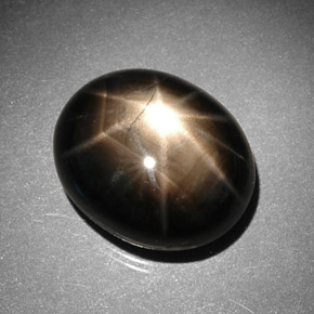 Zafiro estrella negro natural de 11,43 ct, corte óvalo, opaco