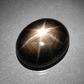 Zafiro estrella negro natural de 11,43 ct, corte óvalo, opaco