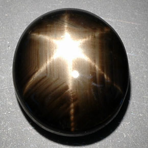 Zafiro estrella negro natural de 10,29 ct, corte óvalo, opaco