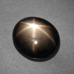 Zafiro estrella negro natural de 13,78 ct, corte óvalo, opaco