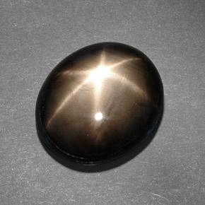 Zafiro estrella negro natural de 13,78 ct, corte óvalo, opaco