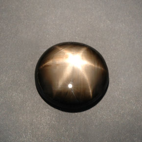 Zafiro estrella negro natural de 12,04 ct, corte óvalo, opaco
