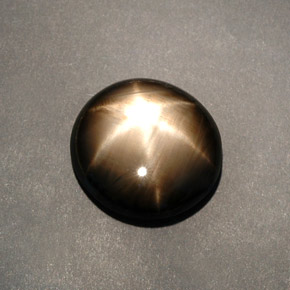 Zafiro estrella negro natural de 12,04 ct, corte óvalo, opaco
