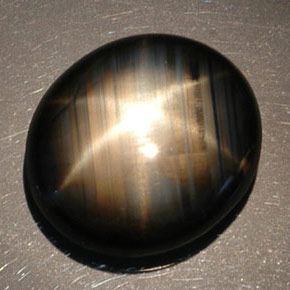 Zafiro estrella negro natural de 16,89 ct, corte óvalo, opaco