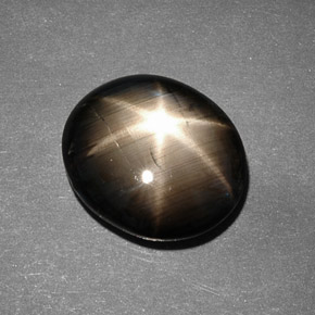Zafiro estrella negro natural de 9,26 ct, corte óvalo, opaco