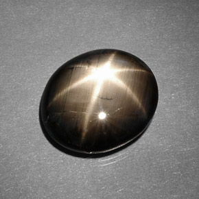 Zafiro estrella negro natural de 9,26 ct, corte óvalo, opaco