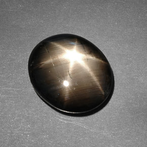 Zafiro estrella negro natural de 9,26 ct, corte óvalo, opaco