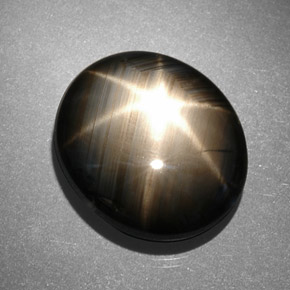 Zafiro estrella negro natural de 13,06 ct, corte óvalo, opaco