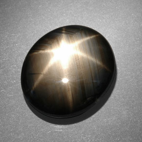 Zafiro estrella negro natural de 13,06 ct, corte óvalo, opaco