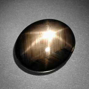 Zafiro estrella negro natural de 10,78 ct, corte óvalo, opaco