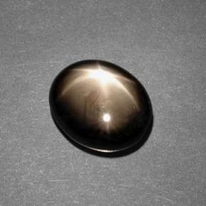 Zafiro estrella negro natural de 7,88 ct, corte óvalo, opaco