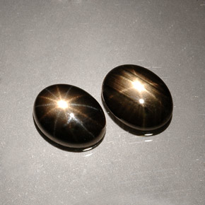 Gemas de zafiro estrella negro natural de  ct, corte óvalo, opaco