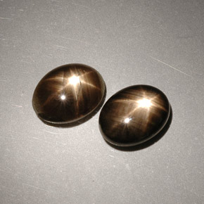 Gemas de zafiro estrella negro natural de  ct, corte óvalo, opaco