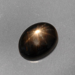 Zafiro estrella negro natural de 1,59 ct, corte óvalo, translúcido