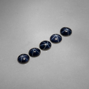 Gemas de zafiro estrella azul natural de  ct, corte óvalo, opaco