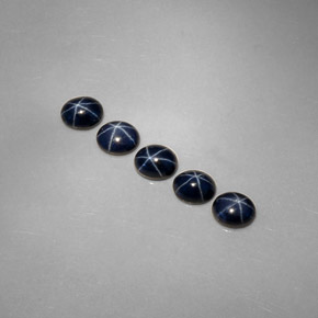 Gemas de zafiro estrella azul natural de  ct, corte óvalo, opaco