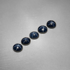 Gemas de zafiro estrella azul natural de  ct, corte óvalo, opaco