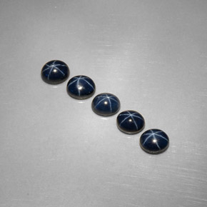 Gemas de zafiro estrella azul natural de  ct, corte óvalo, opaco