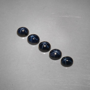 Gemas de zafiro estrella azul natural de  ct, corte óvalo, opaco