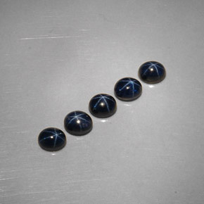 Gemas de zafiro estrella azul natural de  ct, corte óvalo, opaco