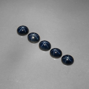Gemas de zafiro estrella azul natural de  ct, corte óvalo, opaco