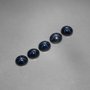 Gemas de zafiro estrella azul natural de  ct, corte óvalo, opaco