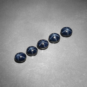 Gemas de zafiro estrella azul natural de  ct, corte óvalo, opaco