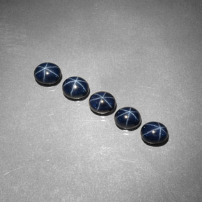 Gemas de zafiro estrella azul natural de  ct, corte óvalo, opaco