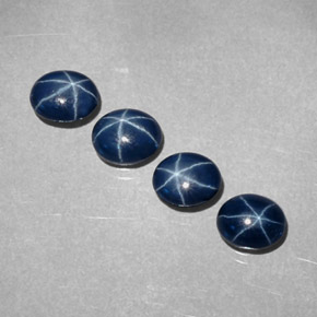 Gemas de zafiro estrella azul natural de  ct, corte óvalo, opaco