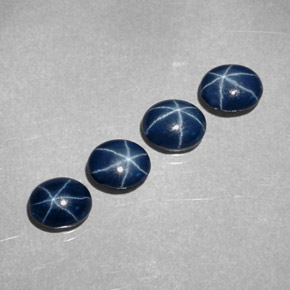 Gemas de zafiro estrella azul natural de  ct, corte óvalo, opaco