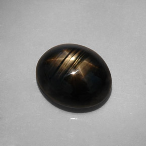 Zafiro estrella negro natural de 10,73 ct, corte óvalo, opaco