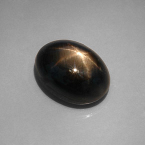 Zafiro estrella negro natural de 12,08 ct, corte óvalo, opaco