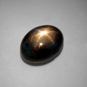 Zafiro estrella negro natural de 10,65 ct, corte óvalo, opaco
