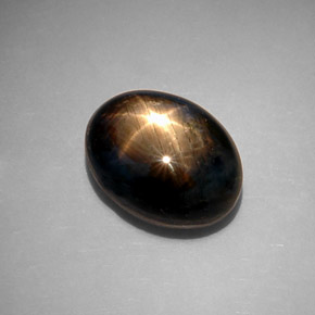 Zafiro estrella negro natural de 10,65 ct, corte óvalo, opaco