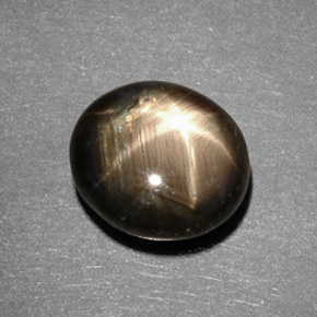 Zafiro estrella negro natural de 5,82 ct, corte óvalo, opaco