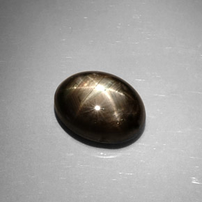 Zafiro estrella negro natural de 6,59 ct, corte óvalo, opaco