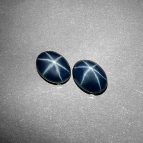 Gemas de zafiro estrella azul natural de  ct, corte óvalo, opaco