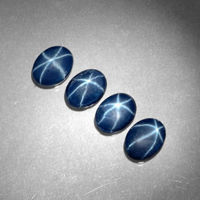 Gemas de zafiro estrella azul natural de  ct, corte óvalo, opaco