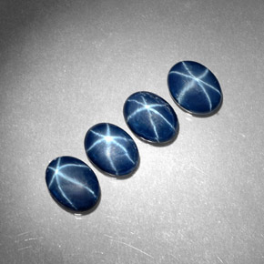 Gemas de zafiro estrella azul natural de  ct, corte óvalo, opaco