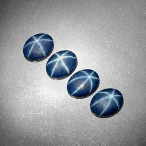 Gemas de zafiro estrella azul natural de  ct, corte óvalo, opaco