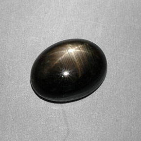 Zafiro estrella negro natural de 7,49 ct, corte óvalo, opaco
